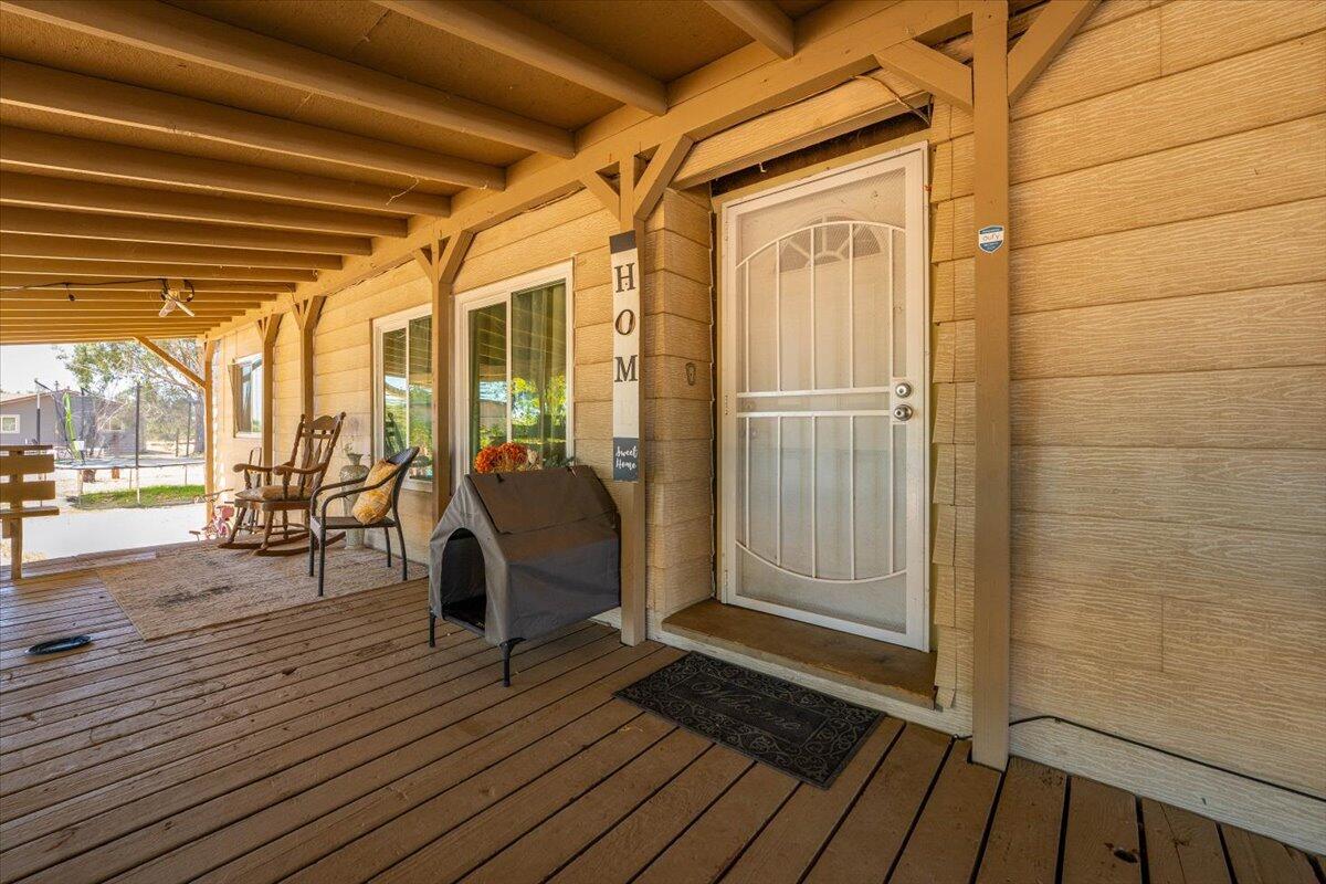 10755 Cody Drive Red Bluff, CA 96080 - Photo 5 of 77 a view of a balcony with wooden floor