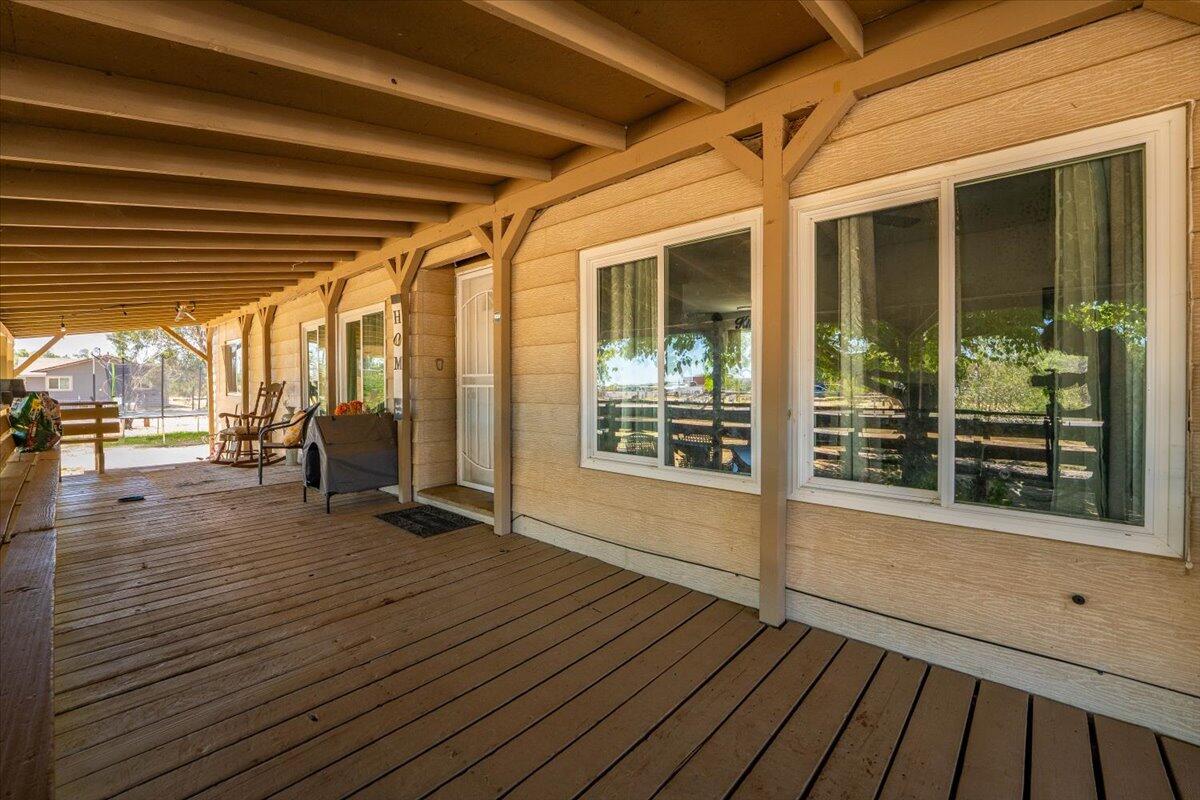 10755 Cody Drive Red Bluff, CA 96080 - Photo 51 of 77 a view of an empty room with wooden floor and a window