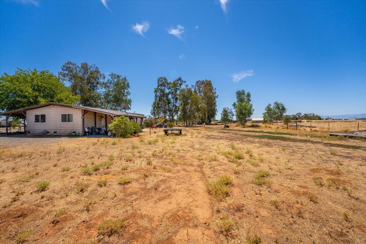 10755 Cody Drive Red Bluff, CA 96080 - Photo 62 of 77 a view of a house with a yard