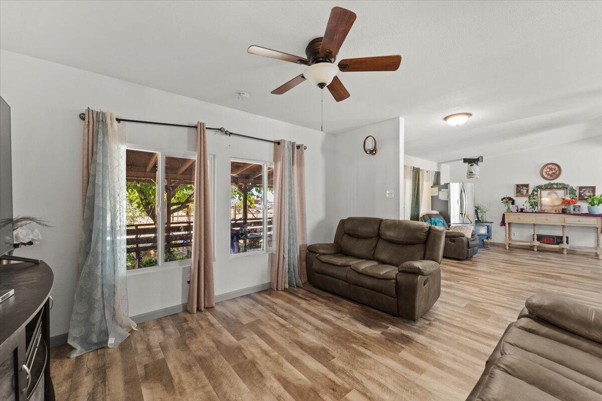 10755 Cody Drive Red Bluff, CA 96080 - Photo 8 of 77 a living room with furniture and a large window