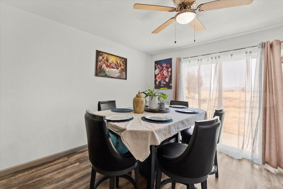 10755 Cody Drive Red Bluff, CA 96080 - Photo 10 of 77 a view of a dining room with furniture window and outside view