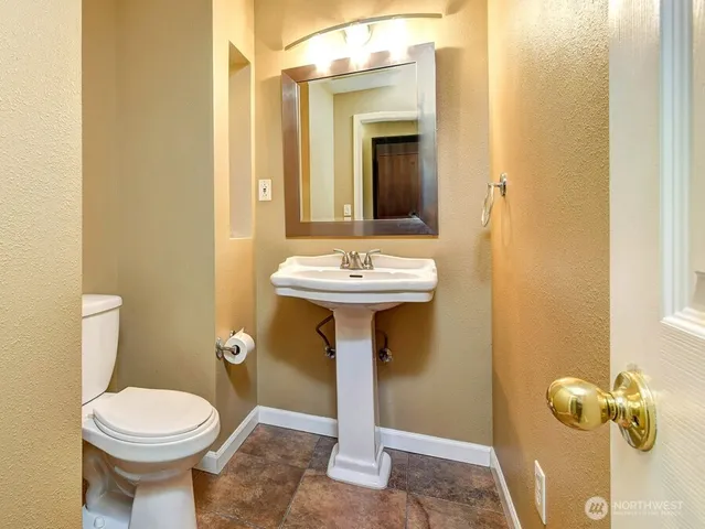 a bathroom with a sink and a toilet