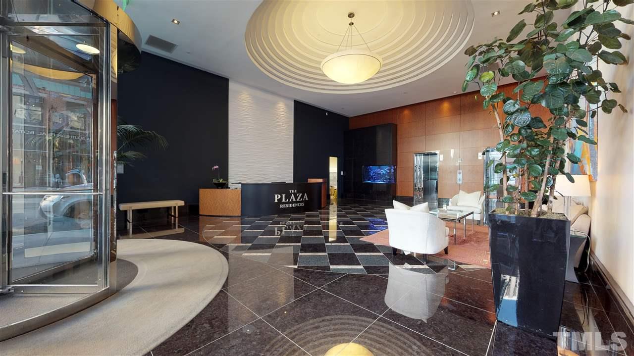 301 Fayetteville Street, Unit 2408 Raleigh, NC 27601 - Photo 17 of 19 Bottom floor lobby. This gorgeous reception is the main entrance to the PNC condos.