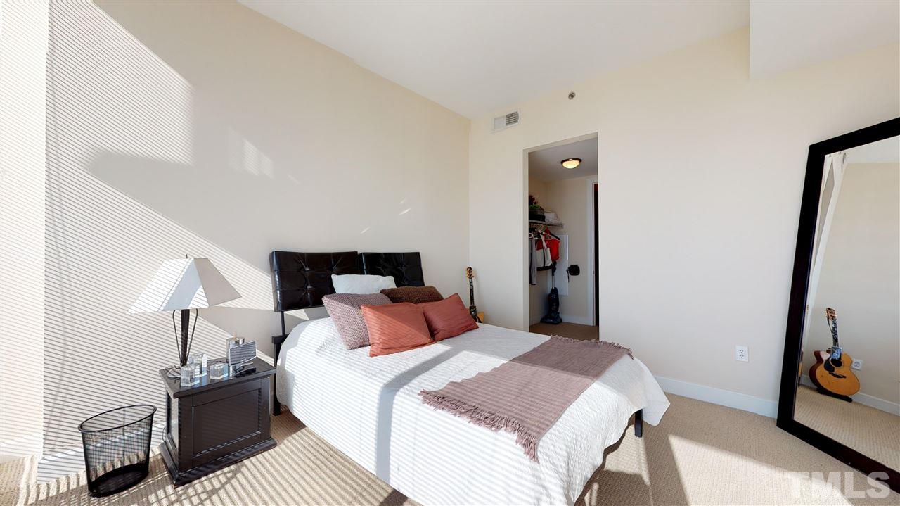 301 Fayetteville Street, Unit 2408 Raleigh, NC 27601 - Photo 10 of 19 Enjoy a walk-in closet and attached bathroom. Paint + Carpet have recently been updated.
