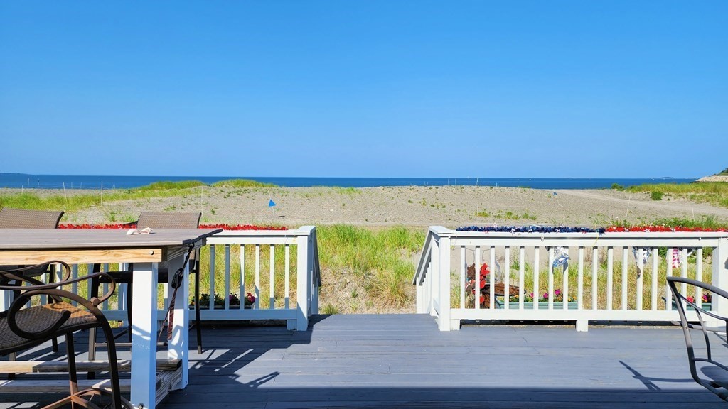 151 The Strand Winthrop, MA 02152 - Photo 2 of 36 a view of a room with wooden floor and windows