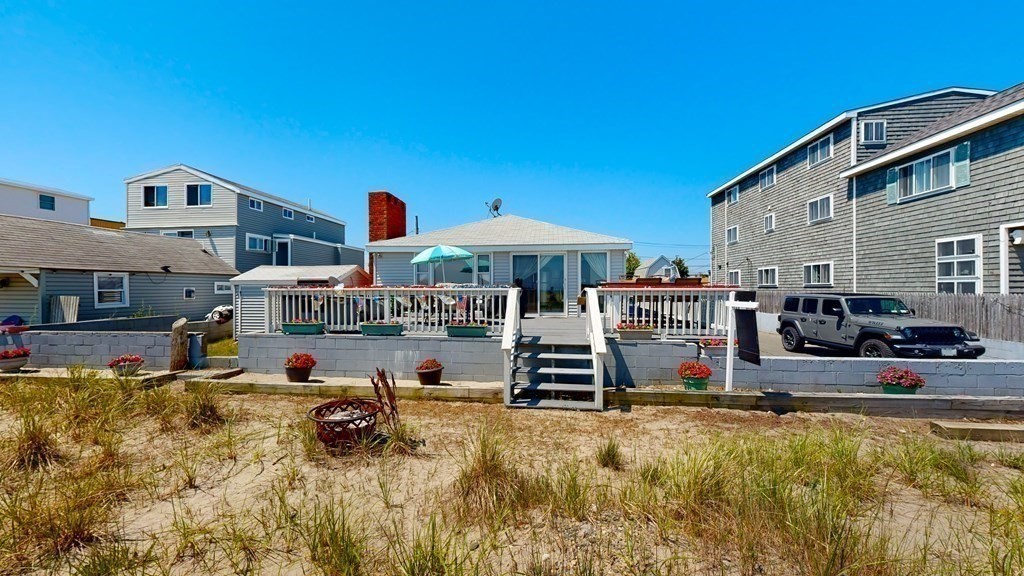 151 The Strand Winthrop, MA 02152 - Photo 5 of 36 a view of a house with swimming pool in front of it