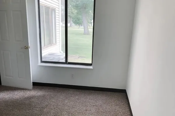 an empty room with a window