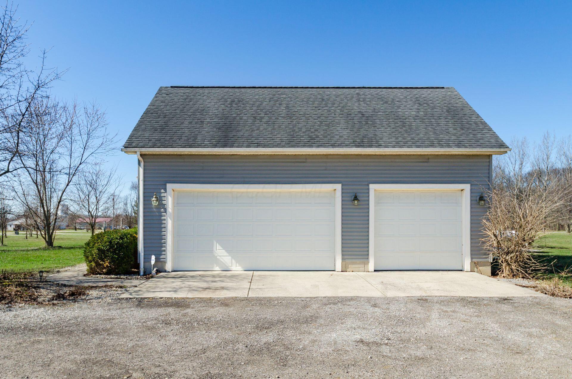 3680 Warrensburg Road Delaware, OH 43015 - Photo 45 of 46 Side load garage with addition outside parking