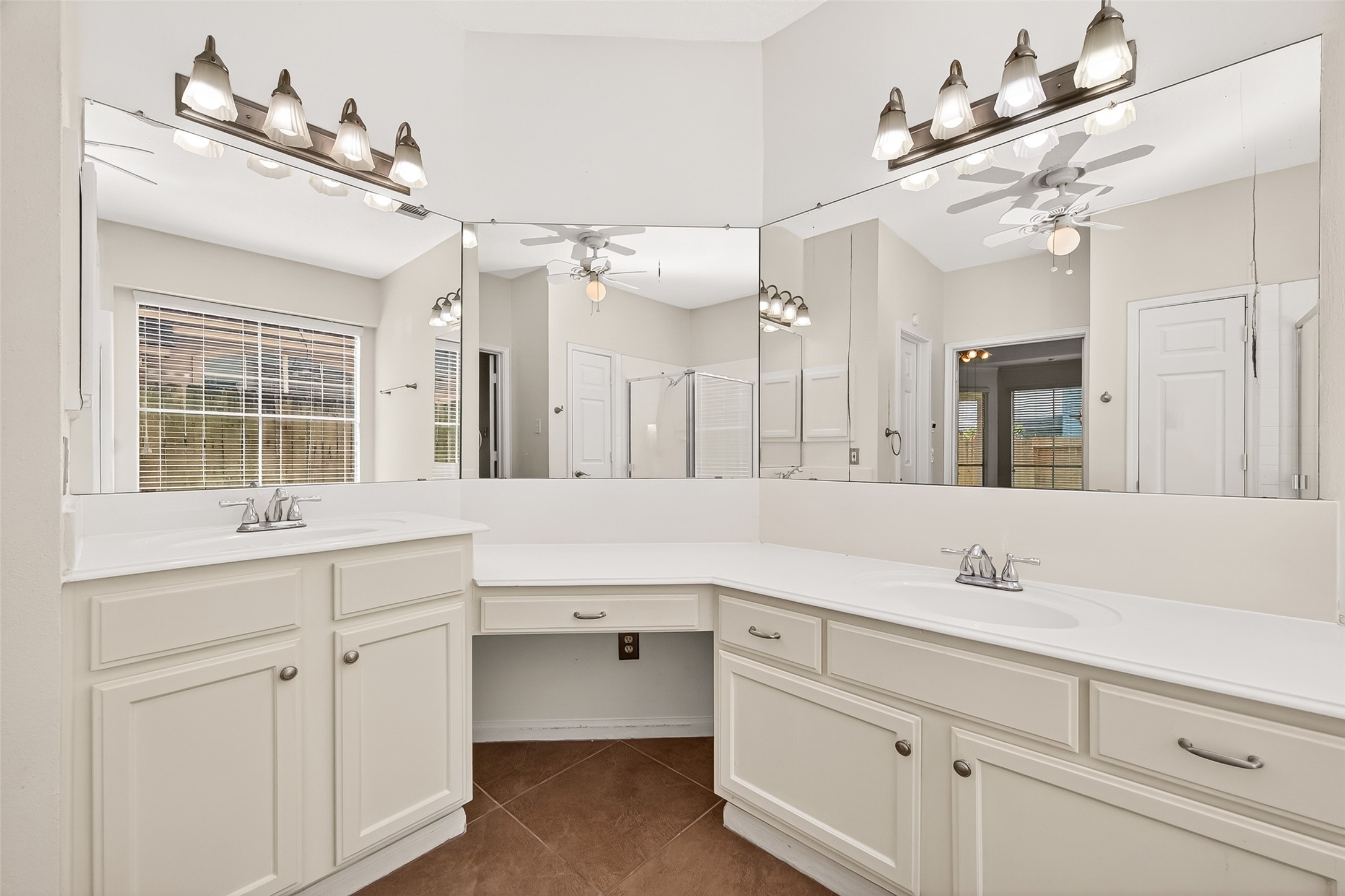 12831 Dove Point Lane Houston, TX 77041 - Photo 39 of 50 a bathroom with a sink vanity and mirror