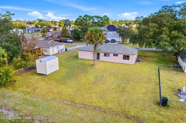 a view of a swimming pool with a lake view