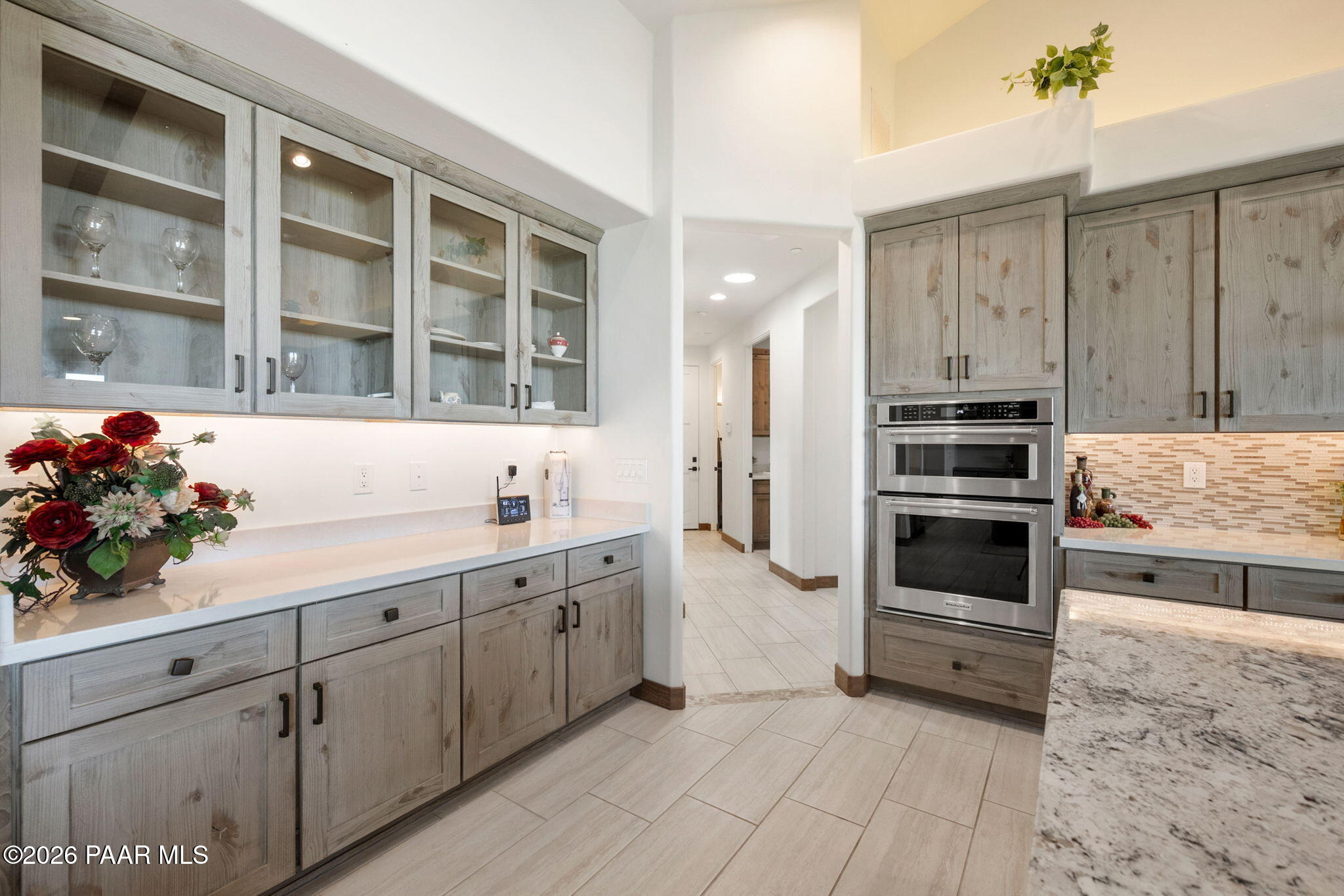 2140 Forest Mountain Road Prescott, AZ 86303 - Photo 11 of 56 a kitchen with granite countertop a sink stainless steel appliances and cabinets