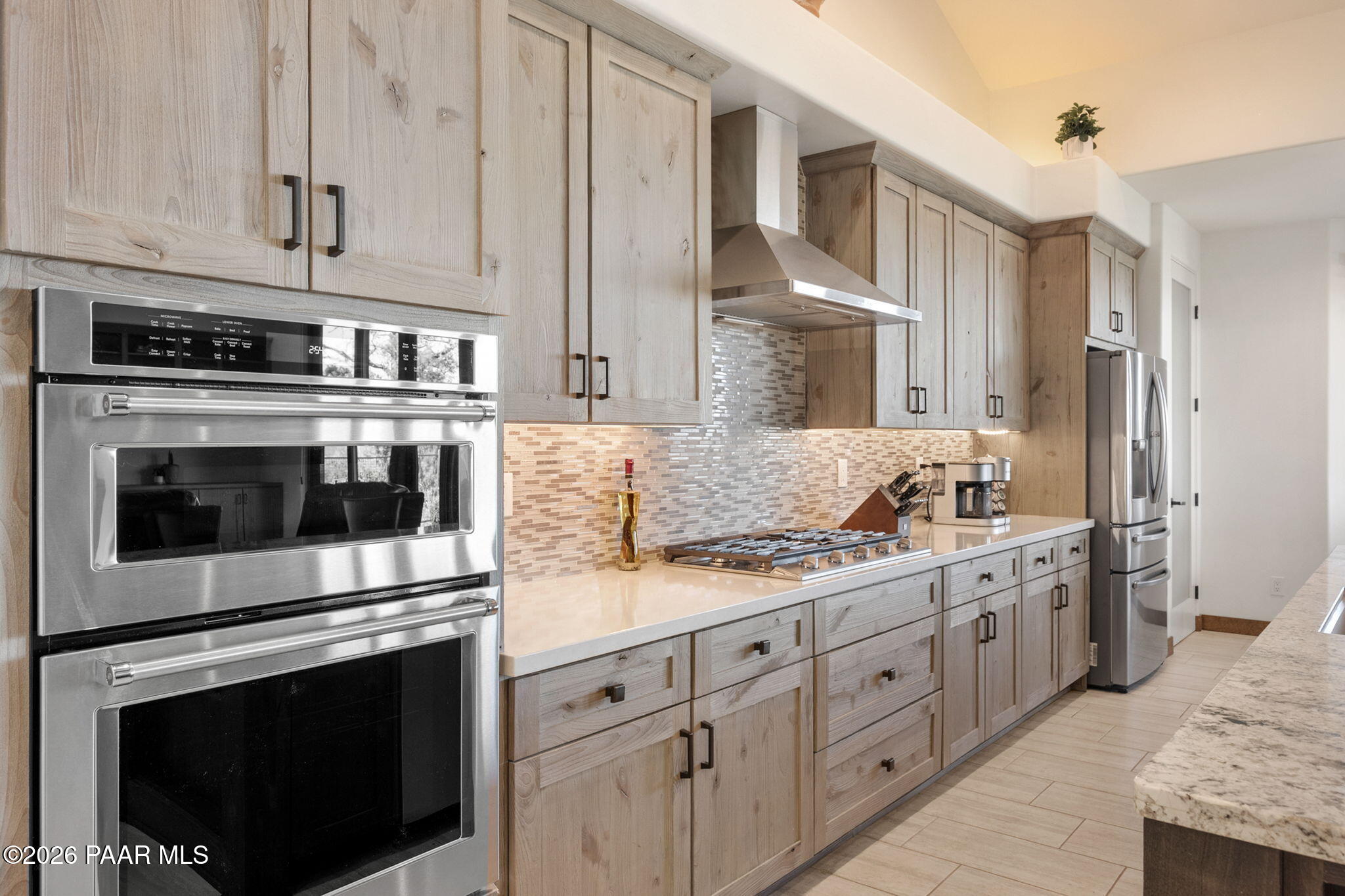 2140 Forest Mountain Road Prescott, AZ 86303 - Photo 13 of 56 a kitchen with stainless steel appliances granite countertop a stove and a sink