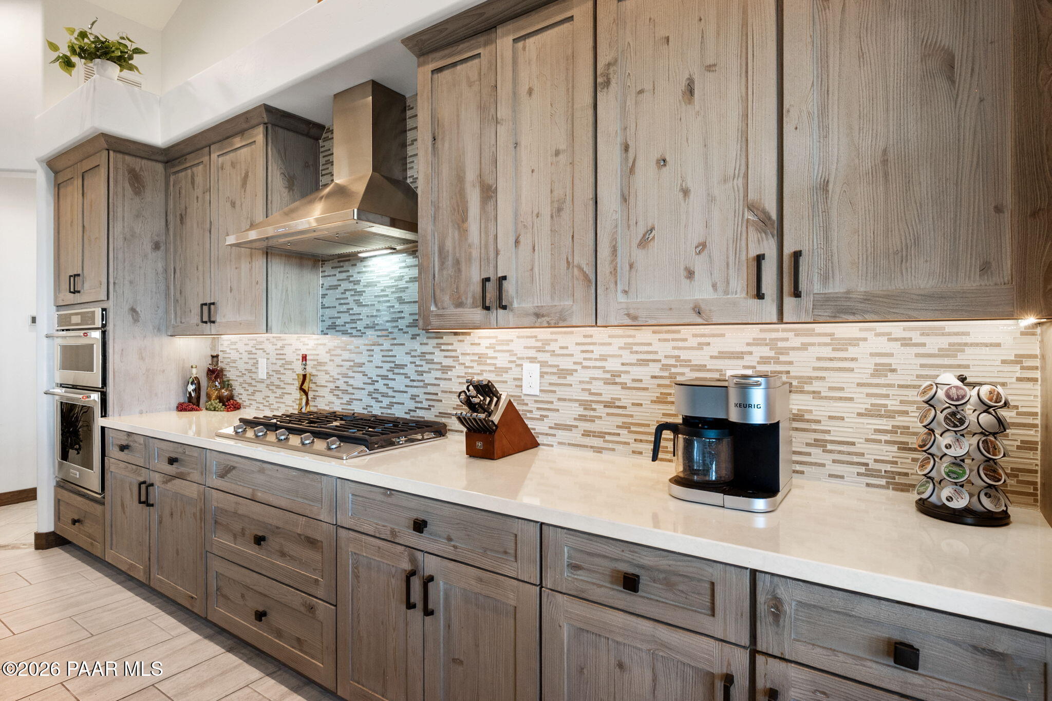 2140 Forest Mountain Road Prescott, AZ 86303 - Photo 18 of 56 a kitchen with stainless steel appliances a stove and cabinets
