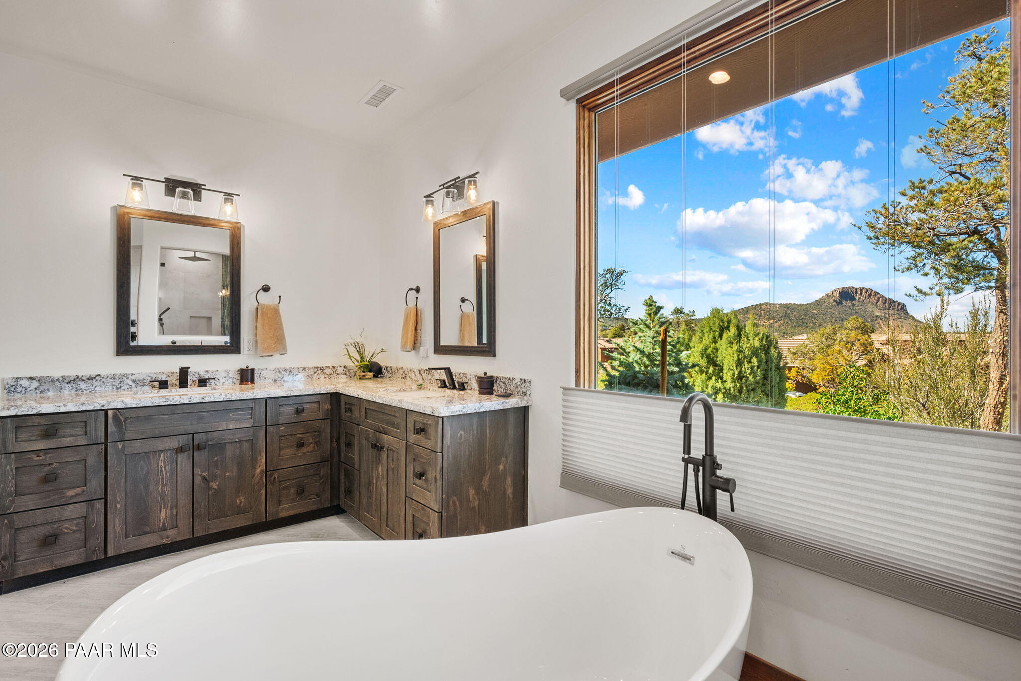 2140 Forest Mountain Road Prescott, AZ 86303 - Photo 22 of 56 a bathroom with a sink vanity and mirror