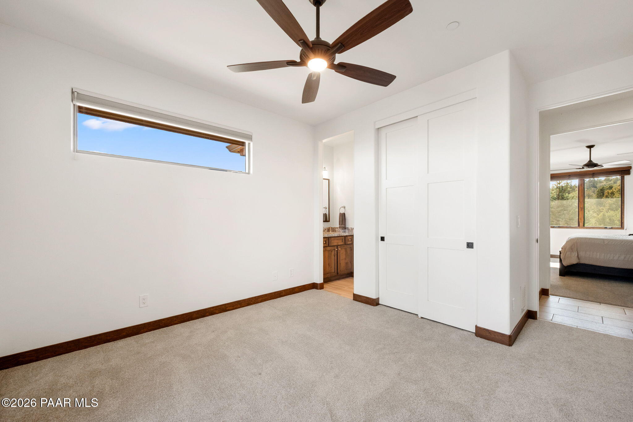 2140 Forest Mountain Road Prescott, AZ 86303 - Photo 32 of 56 a view of a livingroom with a ceiling fan and window