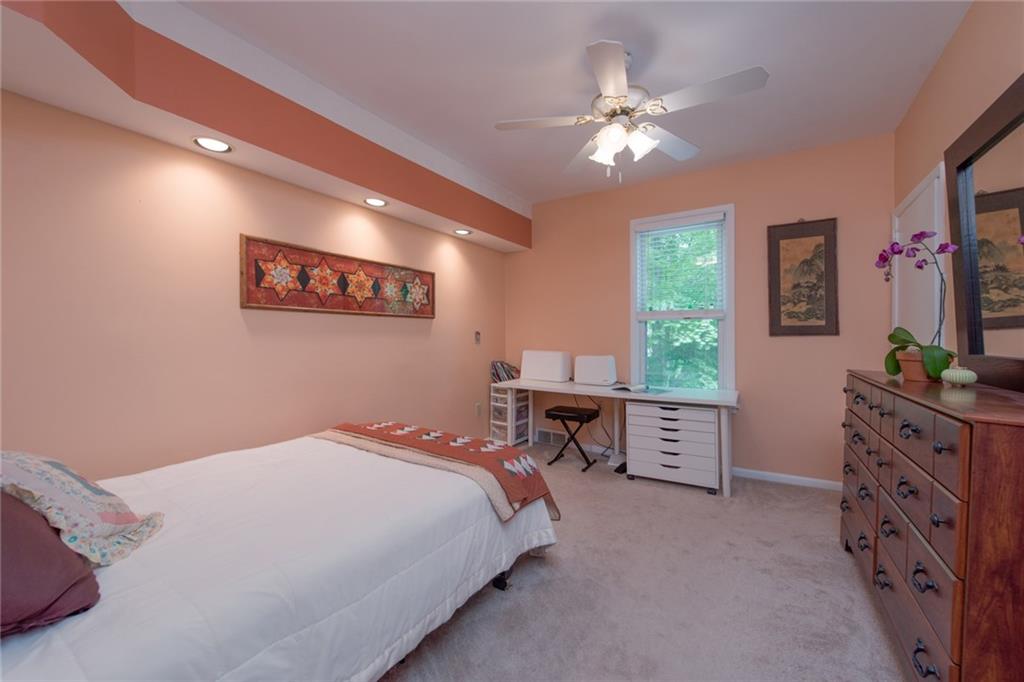 1 Quarry Road Sewickley, PA 15143 - Photo 13 of 25 Recessed lighting, a ceiling fan and a closet define the second bedroom.