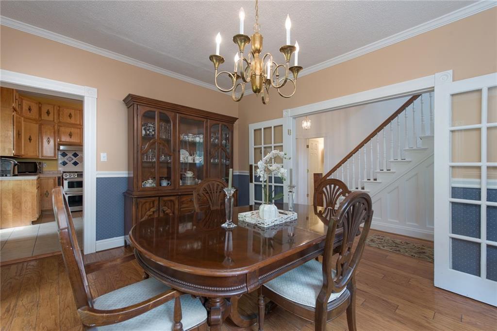 1 Quarry Road Sewickley, PA 15143 - Photo 3 of 25 French glass doors lead into a spacious dining room which also opens to the deck and to the kitchen.