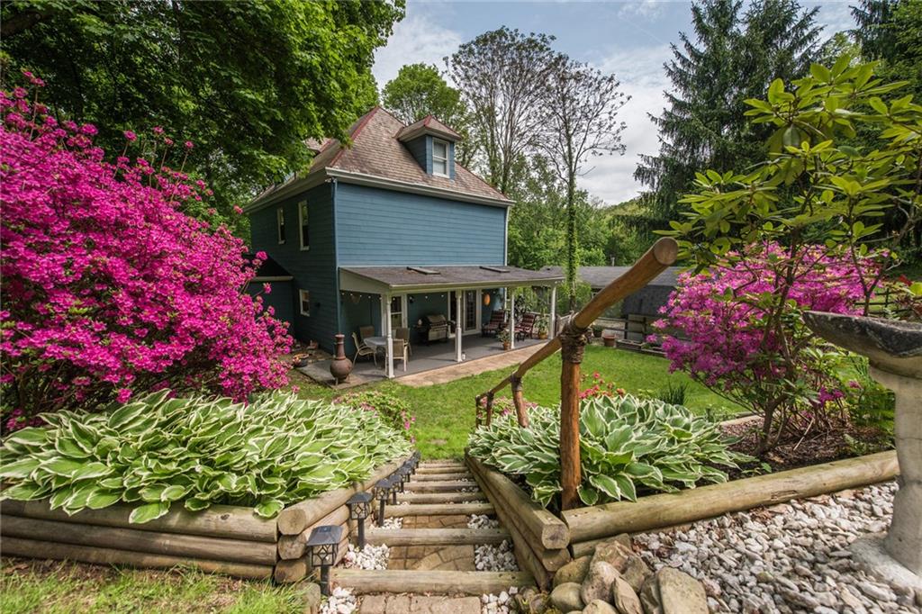 1 Quarry Road Sewickley, PA 15143 - Photo 25 of 25 Professional landscaping and plant placement highlights outdoor spaces around this property.