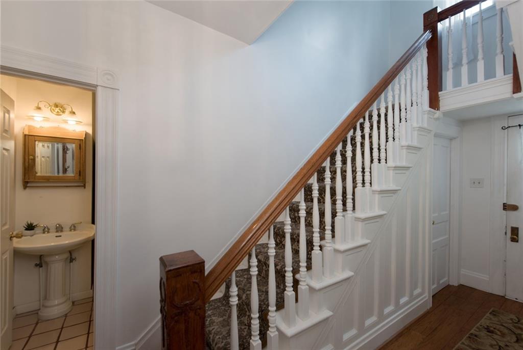 1 Quarry Road Sewickley, PA 15143 - Photo 10 of 25 A full bathroom off the entryway is convenient for guests.