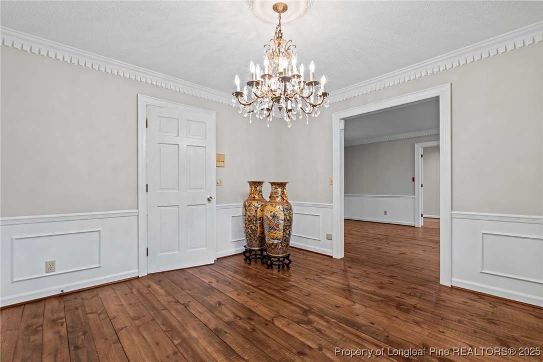 610 Maynard Lake Road Erwin, NC 28339 - Photo 12 of 49 wooden floor in an empty room with a window