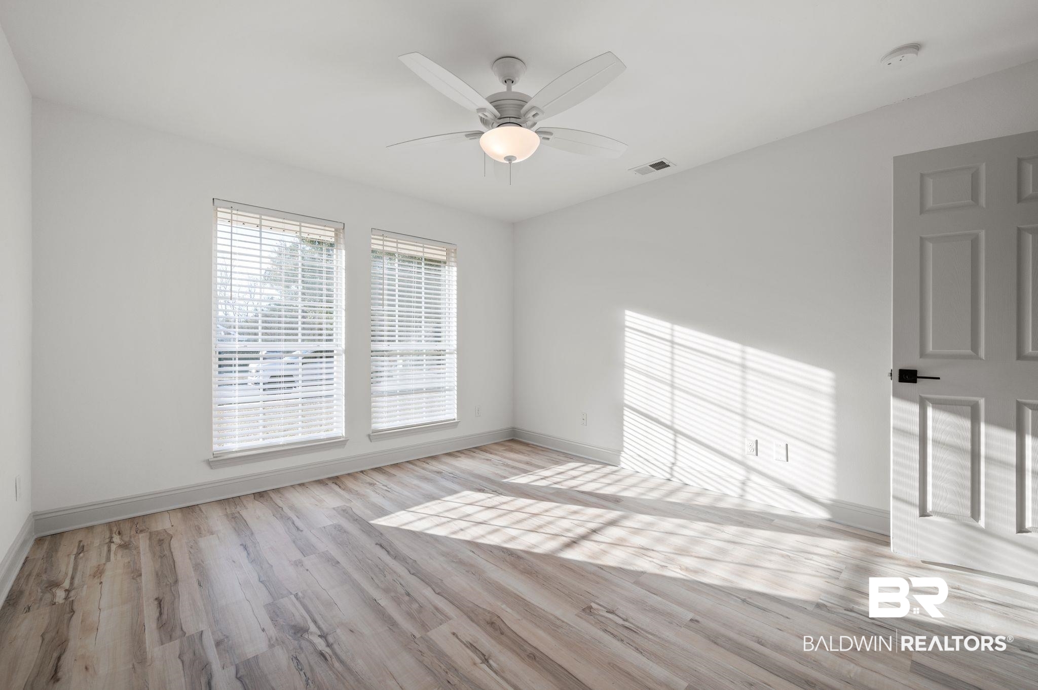 136 Destrehan Road Fairhope, AL 36532 - Photo 22 of 44 Spare room with light wood-type flooring and ceiling fan
