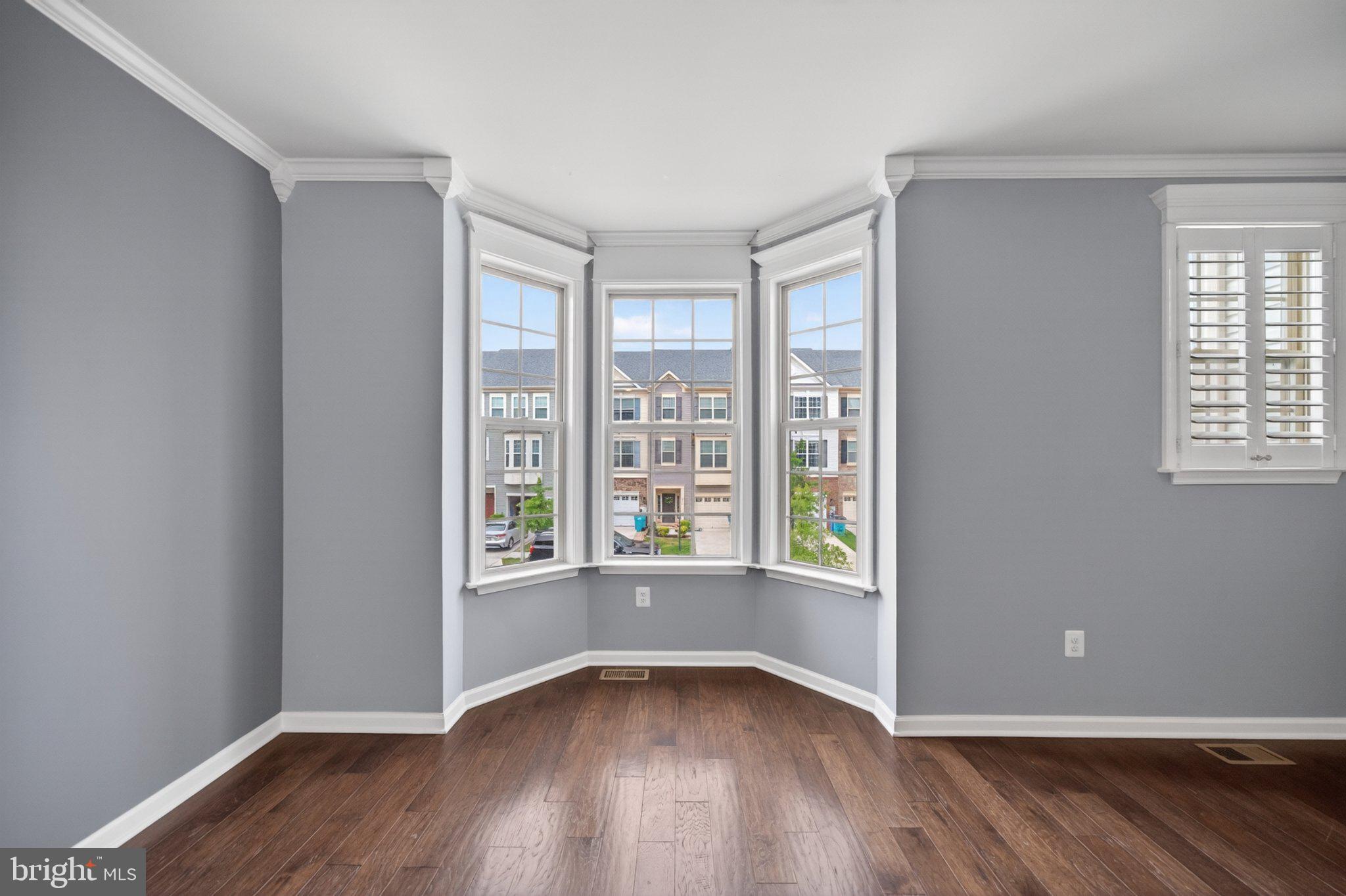 8475 Randell Ridge Road Frederick, MD 21704 - Photo 15 of 36 Bright bay windows invite natural light.