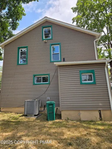 a view of a house with street