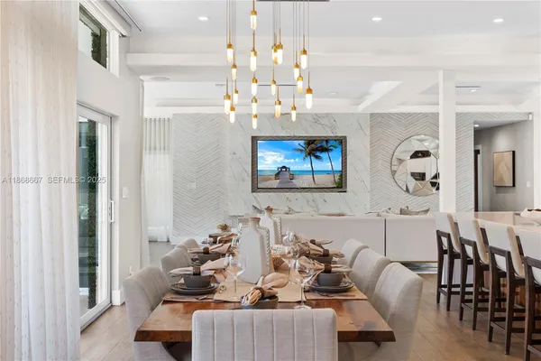 a bedroom with a bed and mirror