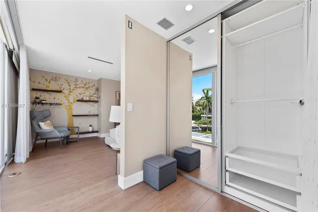 a bathroom with a shower and a sink