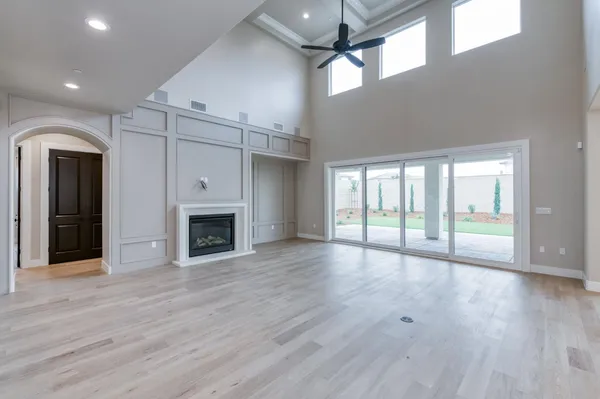 a kitchen with kitchen island granite countertop a sink and stainless steel appliances