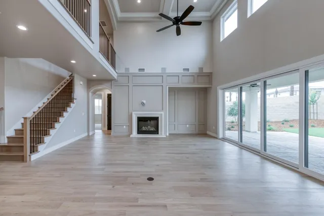 a kitchen with kitchen island a sink stainless steel appliances and cabinets