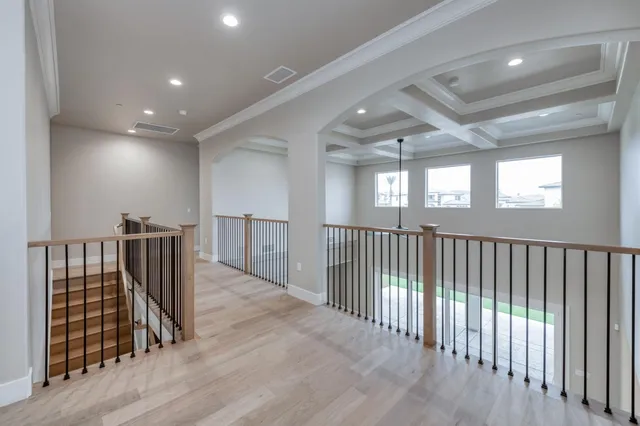 a front view of a house with lots of windows and shower
