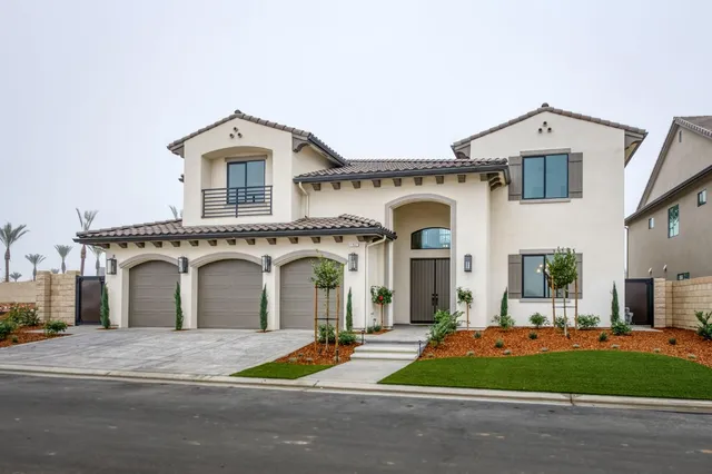 a front view of a house with lots of windows and shower
