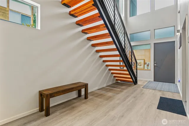 a view of entryway with stairs