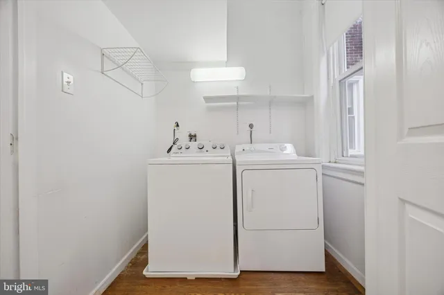 a utility room with dryer and washer