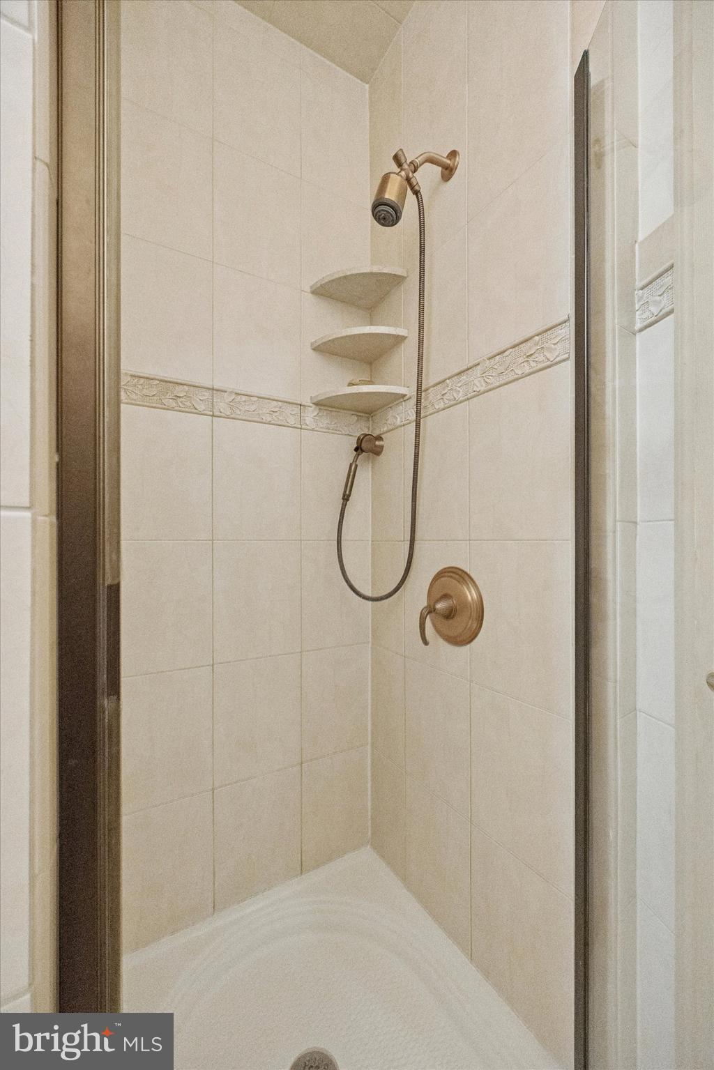 1605 South 8th Street Philadelphia, PA 19148 - Photo 15 of 26 a bathroom with a shower