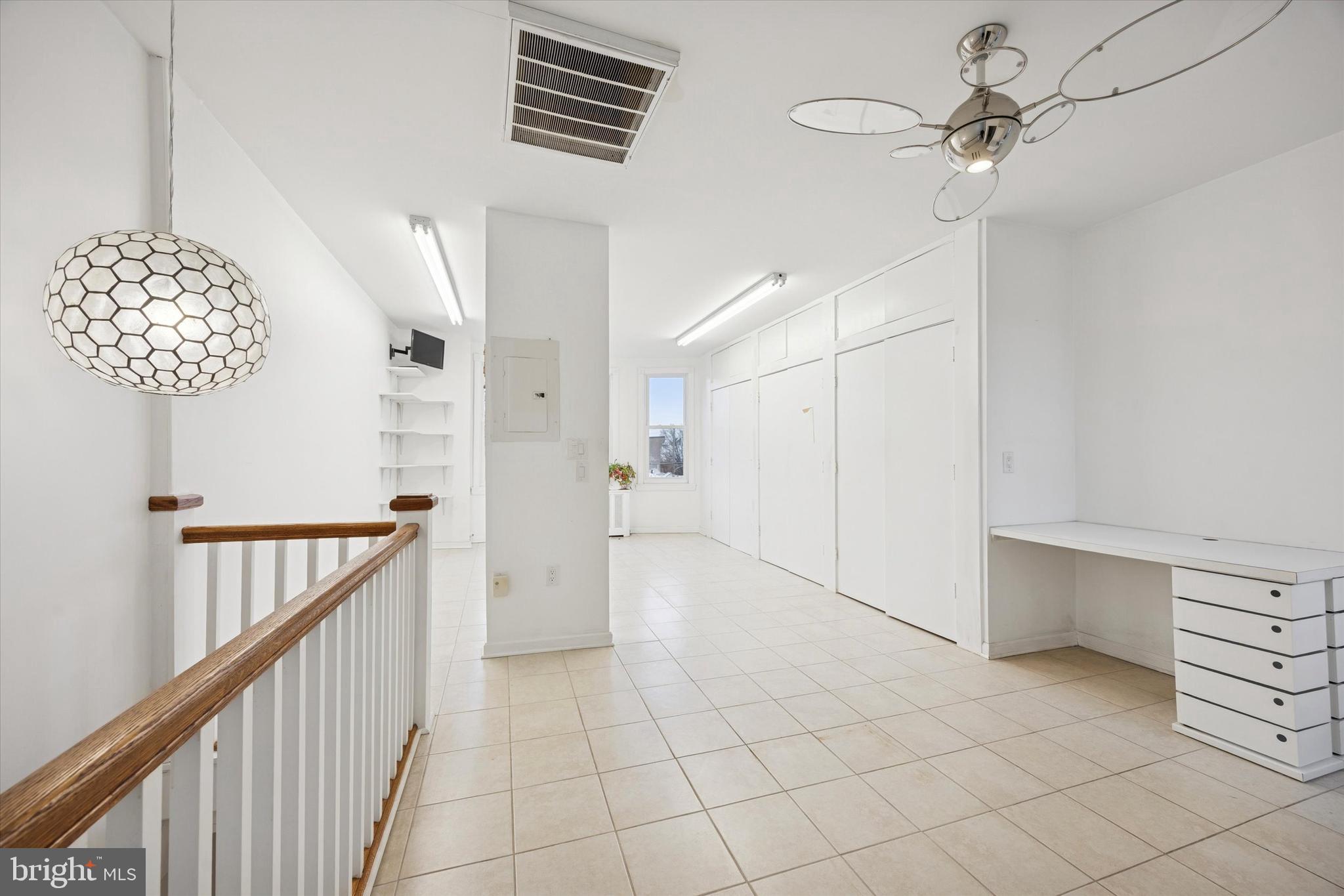 1605 South 8th Street Philadelphia, PA 19148 - Photo 19 of 26 a view of entryway and kitchen