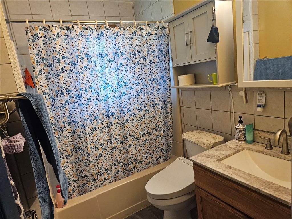 521 West Butler Street Mercer, PA 16137 - Photo 12 of 23 a bathroom with a sink toilet and shower