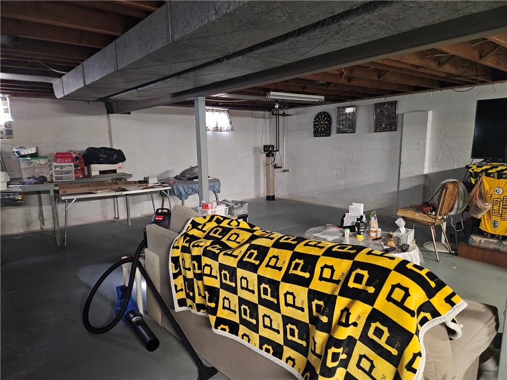 521 West Butler Street Mercer, PA 16137 - Photo 17 of 23 a bed room with furniture and gym equipment