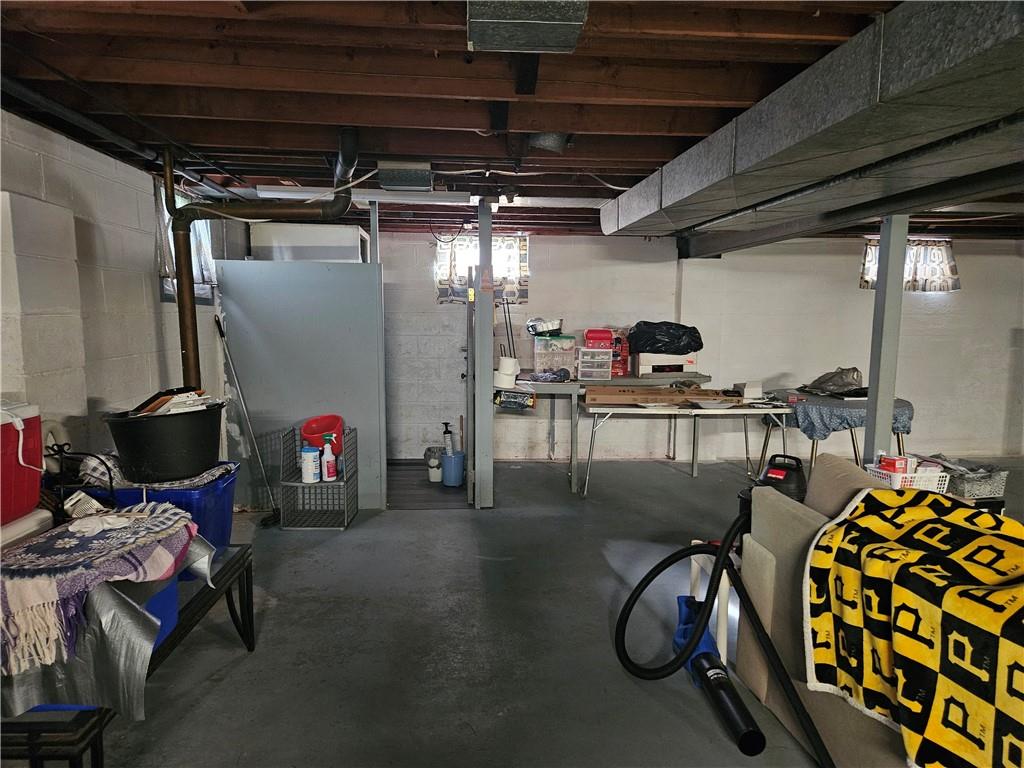 521 West Butler Street Mercer, PA 16137 - Photo 18 of 23 a room with gym equipment and a table