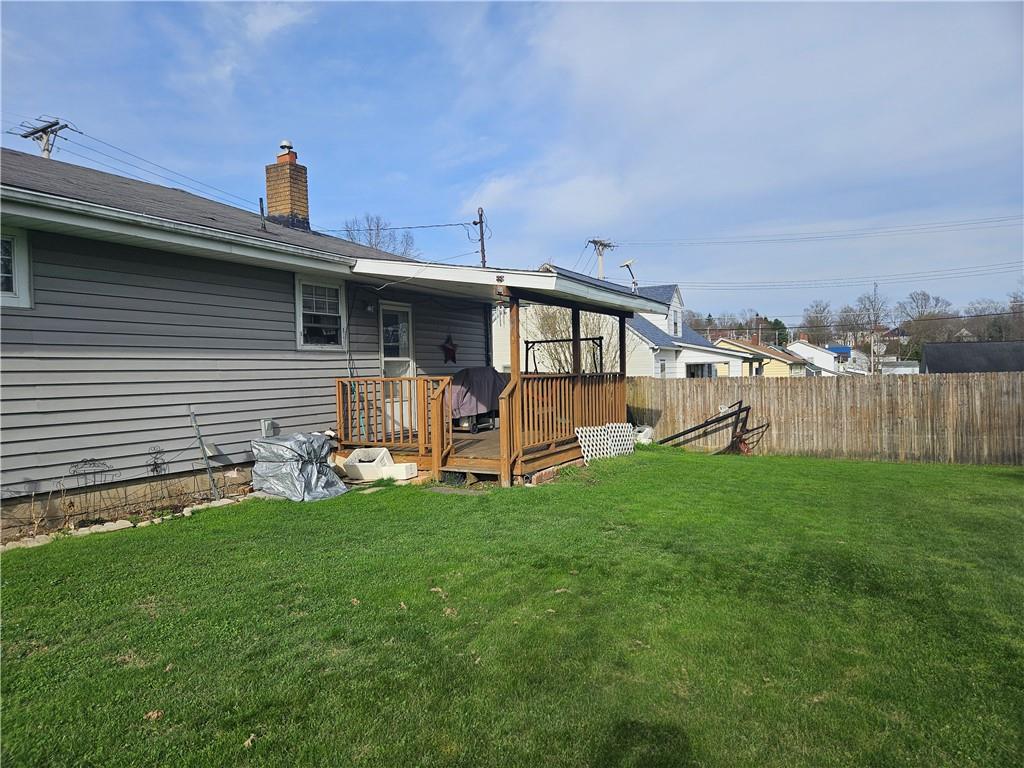 521 West Butler Street Mercer, PA 16137 - Photo 20 of 23 a view of a house with a yard and deck