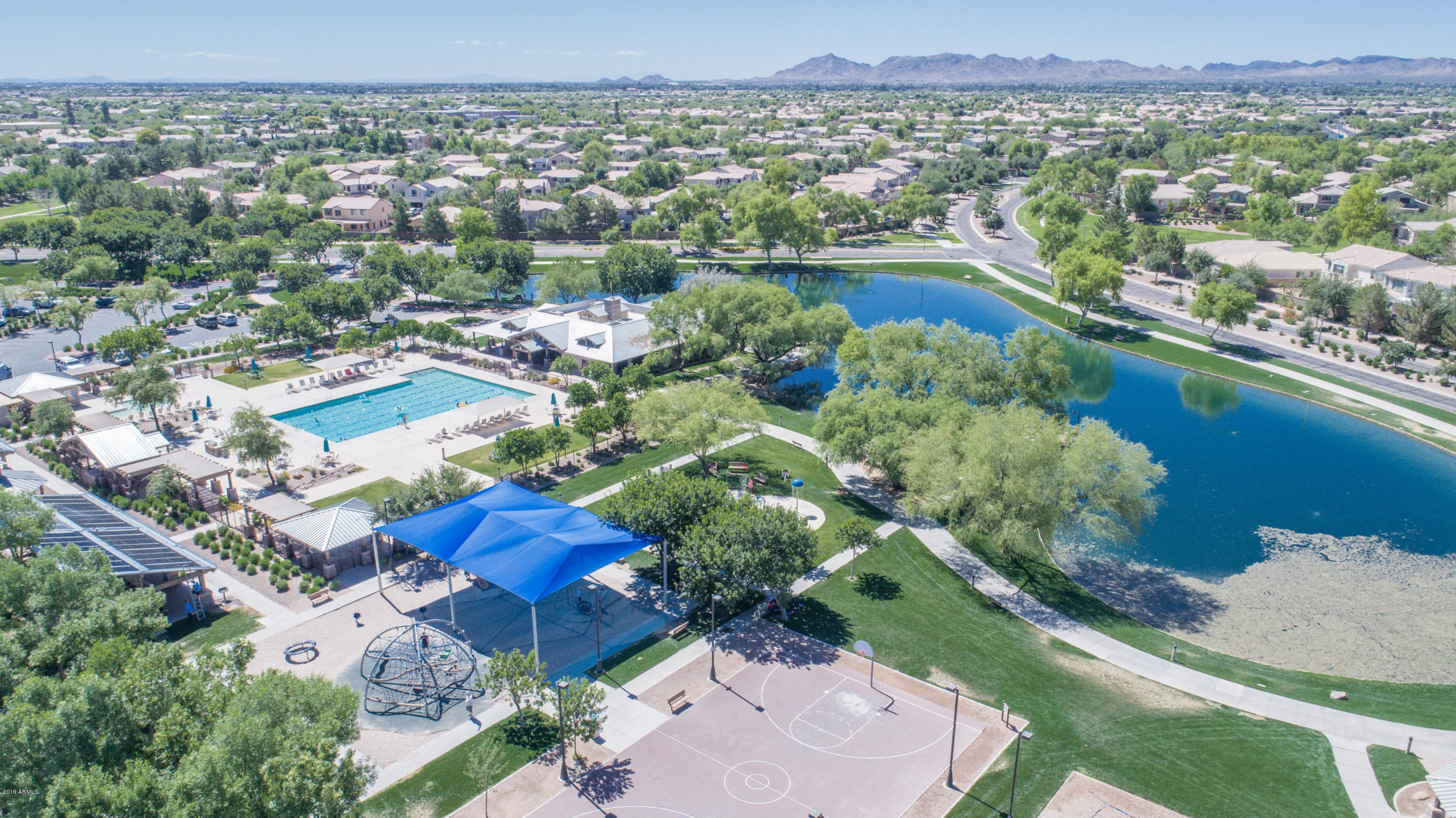 4328 South Rim Court Gilbert, AZ 85297 - Photo 35 of 36 an aerial view of a city