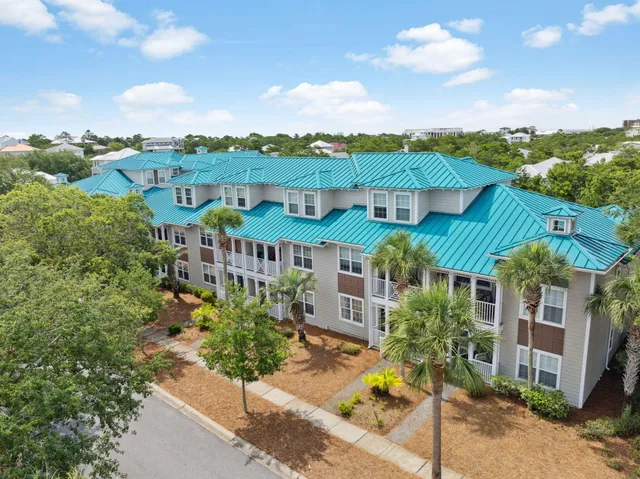 a view of a house with a garden