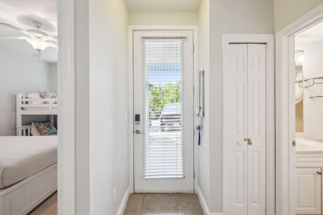 a view of an entryway with wooden floor