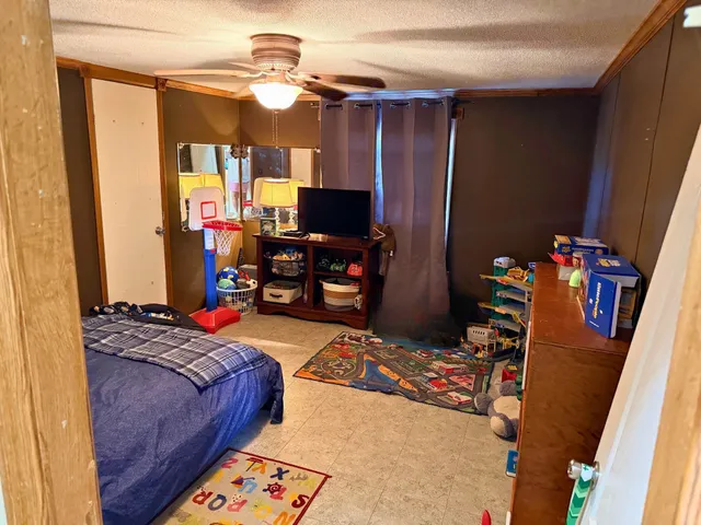 a bathroom with a toilet and a sink