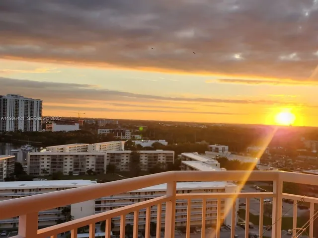 a view of city with ocean