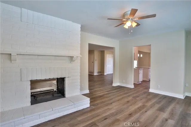 a view of livingroom with hardwood floor and ceiling fan