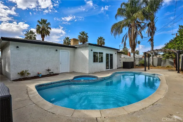 a view of outdoor space and swimming pool