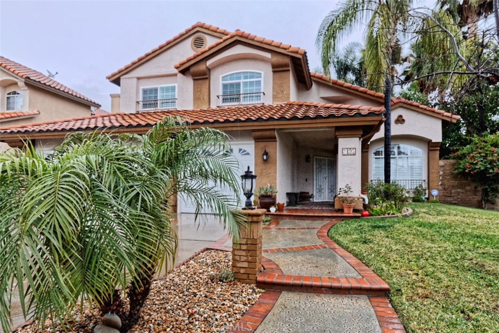 7495 Old Bridge Road Highland, CA 92346 - Photo 1 of 1 a view of a house with sitting area and garden
