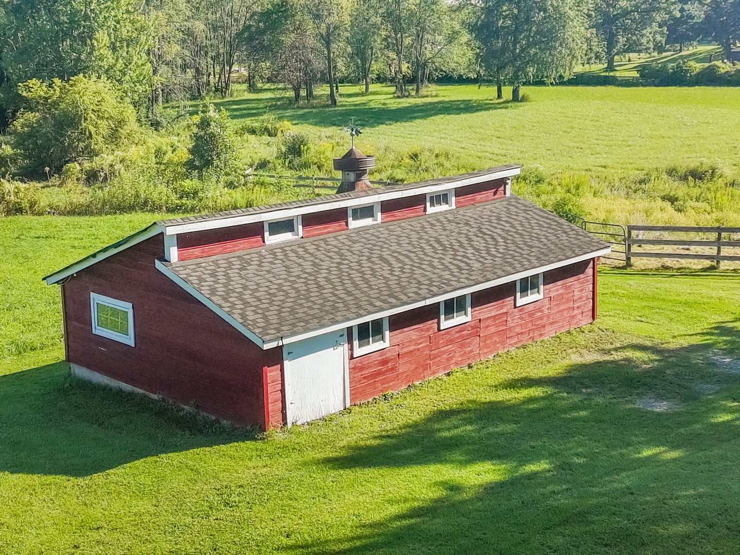 19303 McGuire Road Harvard, IL 60033 - Photo 13 of 36 a view of a backyard with a garden and plants